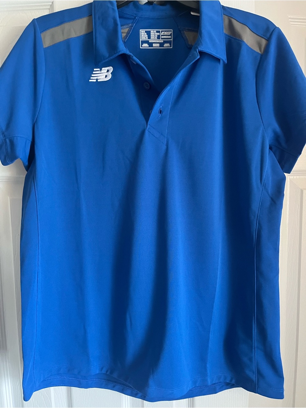 New Balance Women’s Royal Blue Polo Shirt